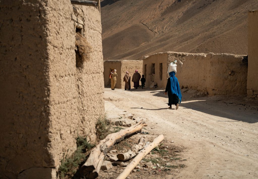A figure at the cliffs, Bamyan, Afghanistan — photo by Shamshad Noori